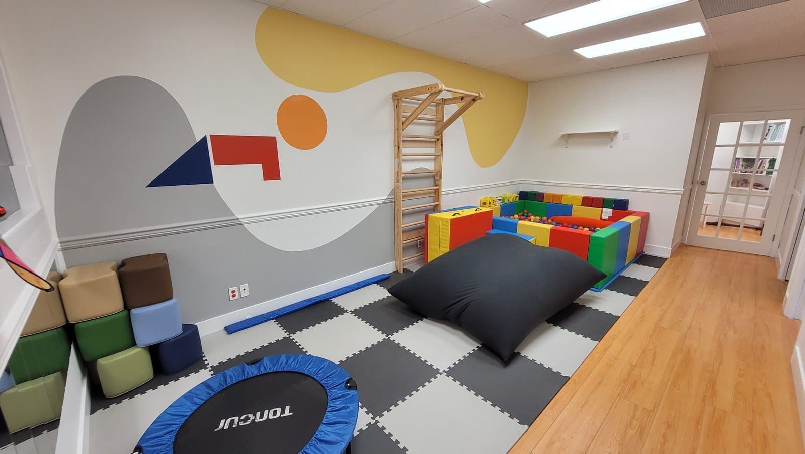 Child practicing balance and coordination during therapy