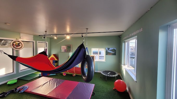Colorful therapy room designed for children at KidStart